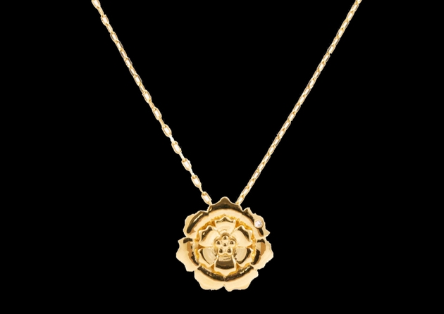 A gold necklace from The Wildflower Collection by Pureshore Jewellery