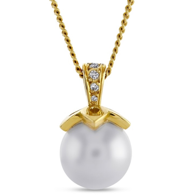 South-Sea pearl pendant set in a diamond floral bale in 18-carat yellow gold