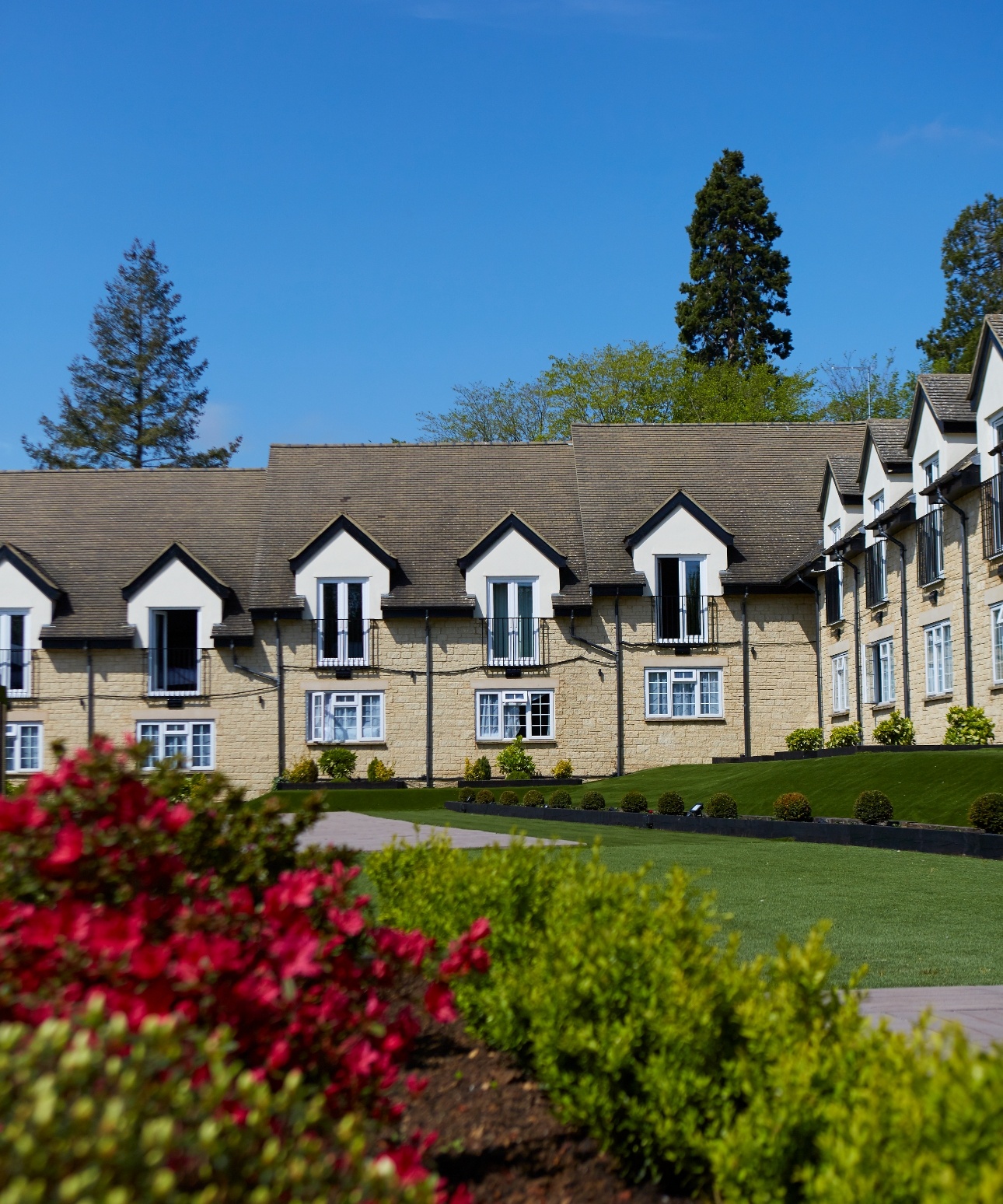 The Chesterton Hotel is built of cotswold stone with each window having a juliette balcony and french doors