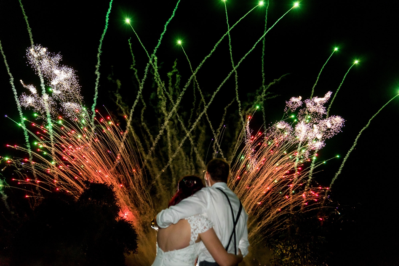 Just married couple watching fireworks