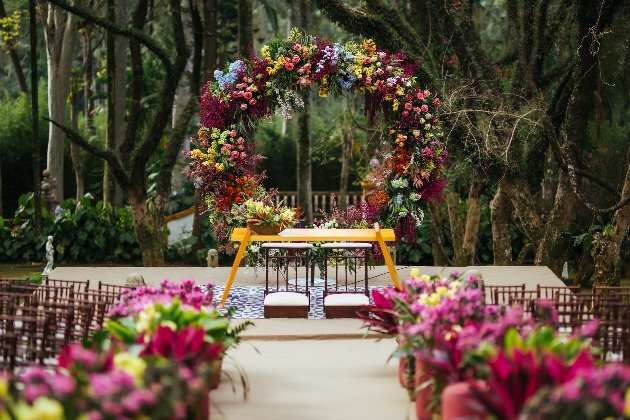 moongate of flowers at outdoor wedding